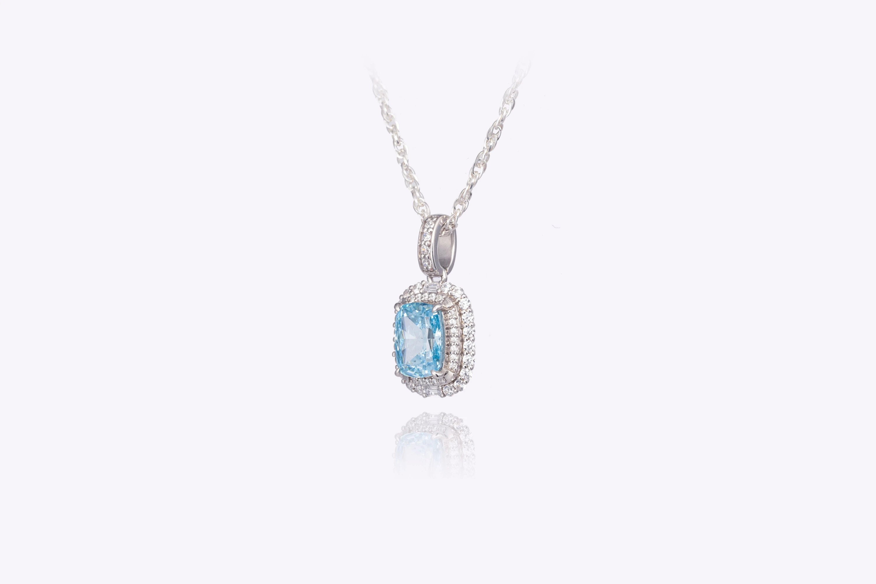 Aqua Glow: Cushion-Cut Blue Lab-Created Diamond Halo Pendant