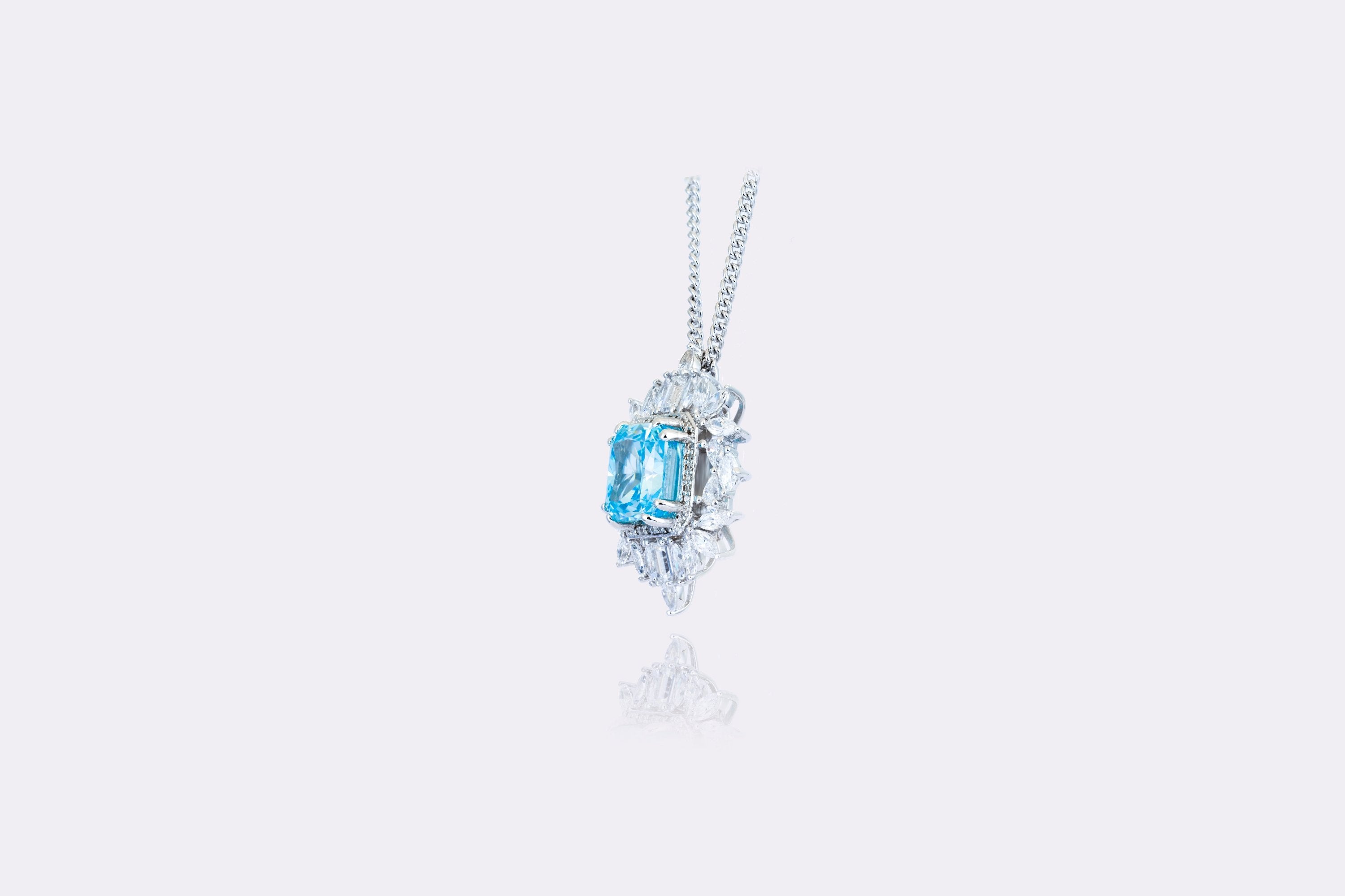  Captivating Blue Topaz and Diamond Pendant