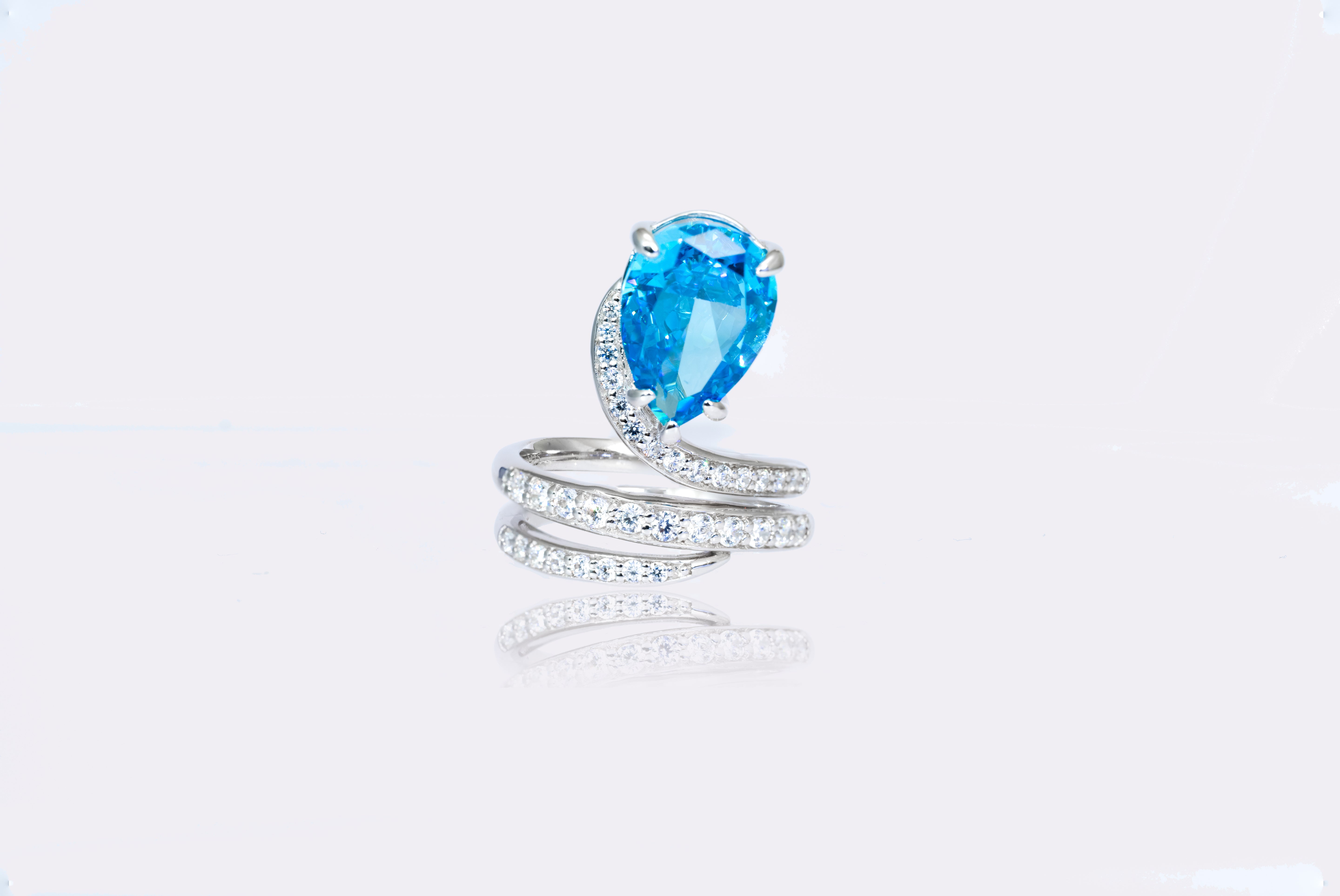 Celestial Tide Aquamarine Spiral Silver Ring