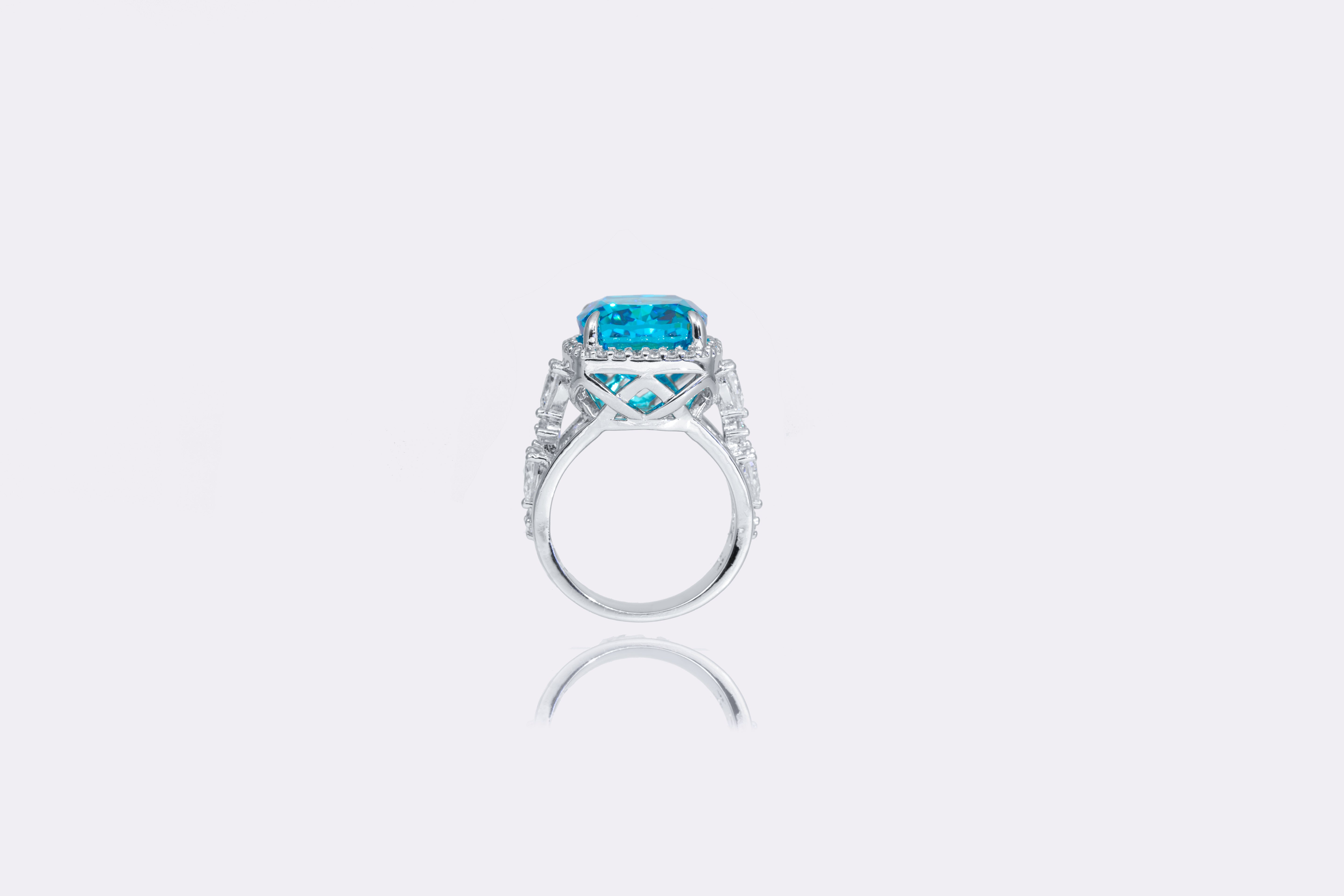 Deep Ocean Blue Diamond Halo Ring