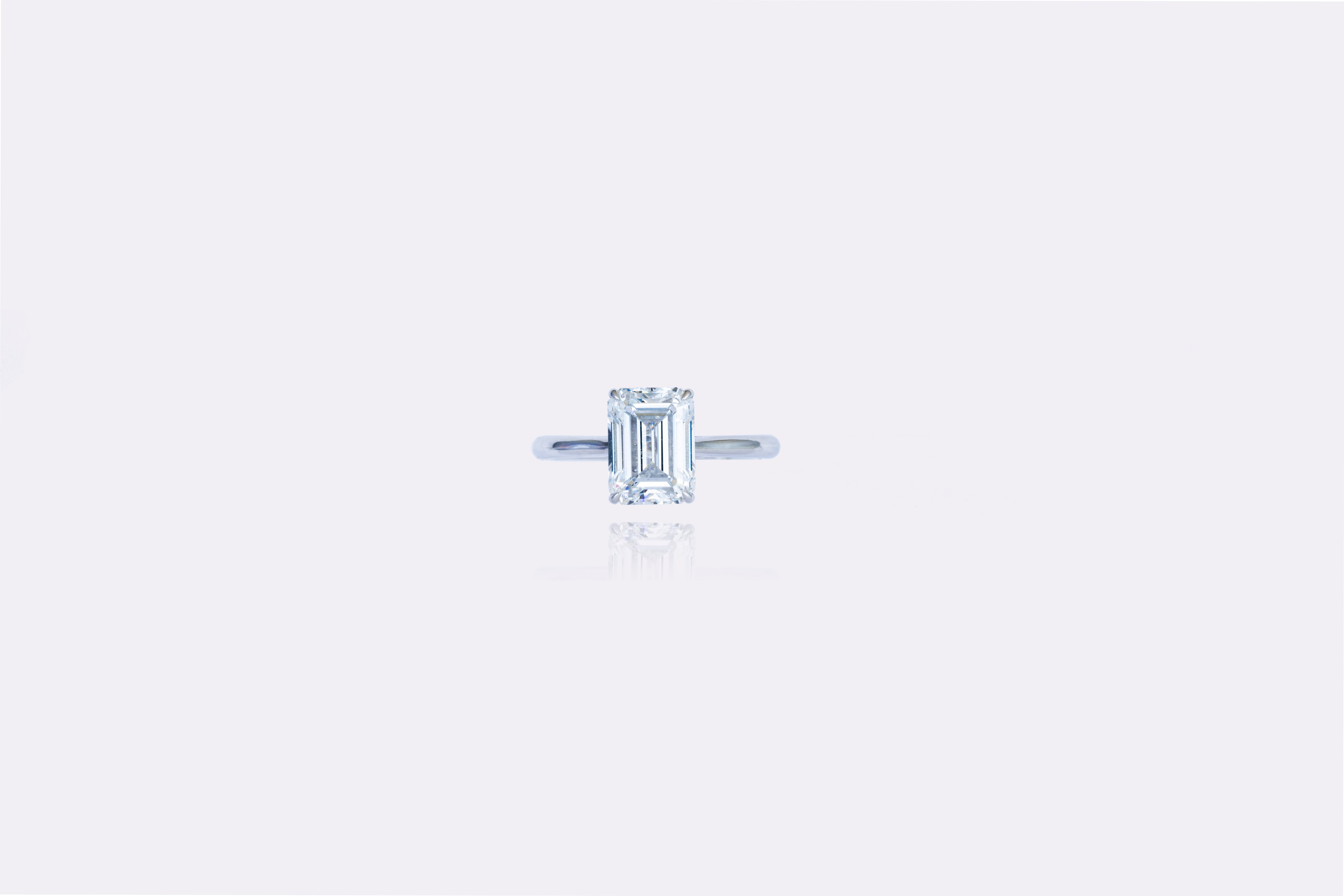 Elegant Simplicity: Emerald-Cut Solitaire Diamond Ring