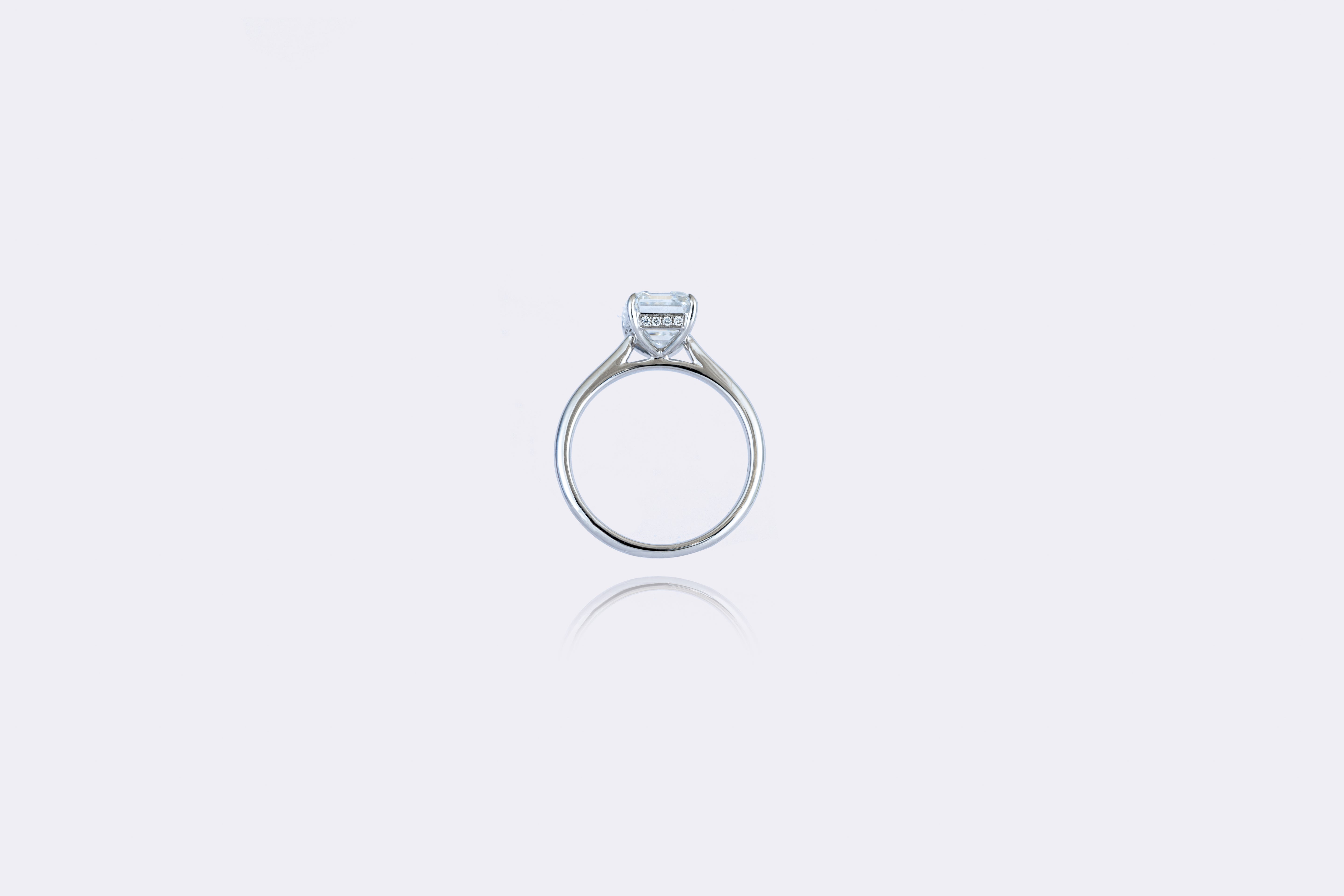 Elegant Simplicity: Emerald-Cut Solitaire Diamond Ring