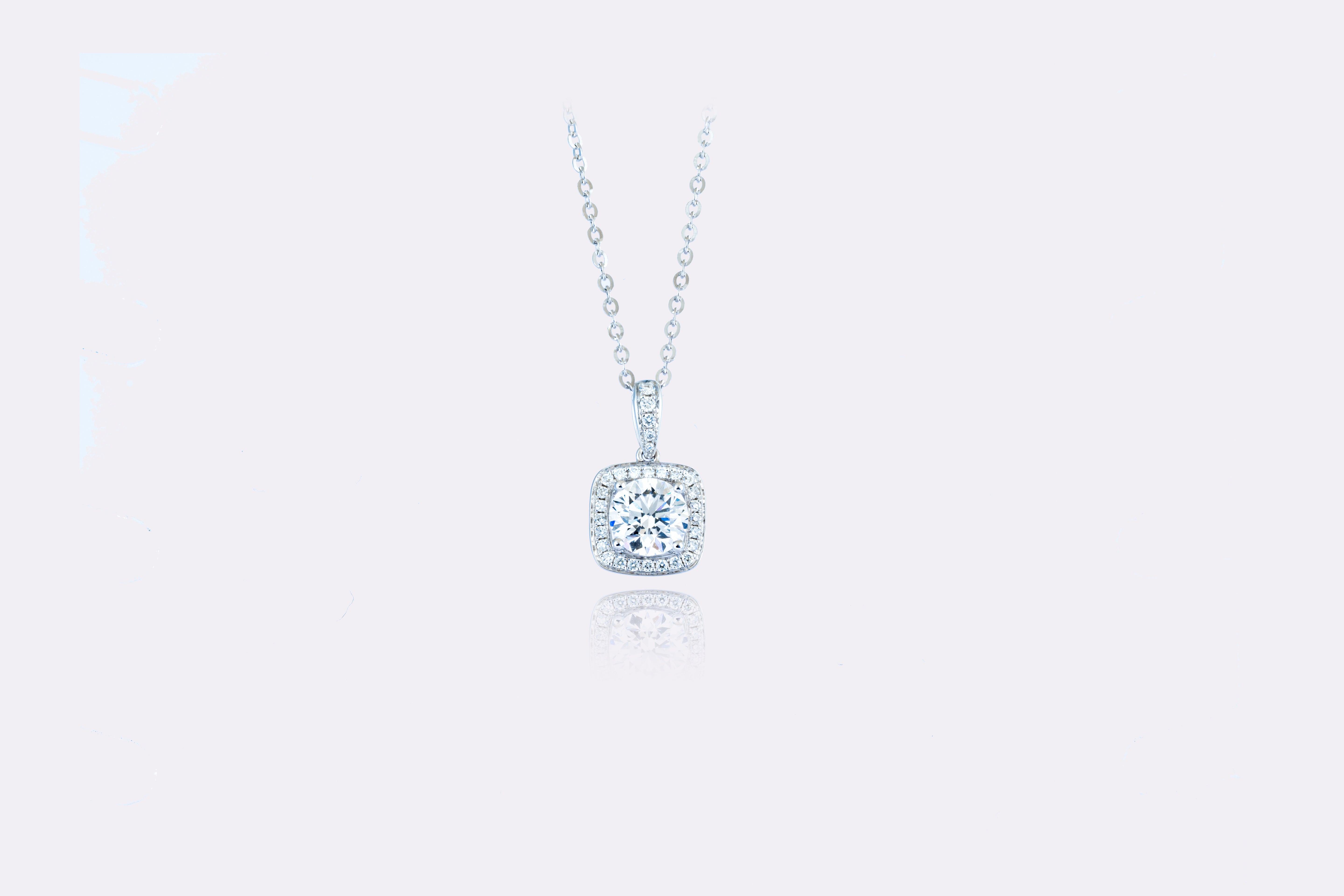 Luminous Harmony: Elegant Diamond Halo Pendant