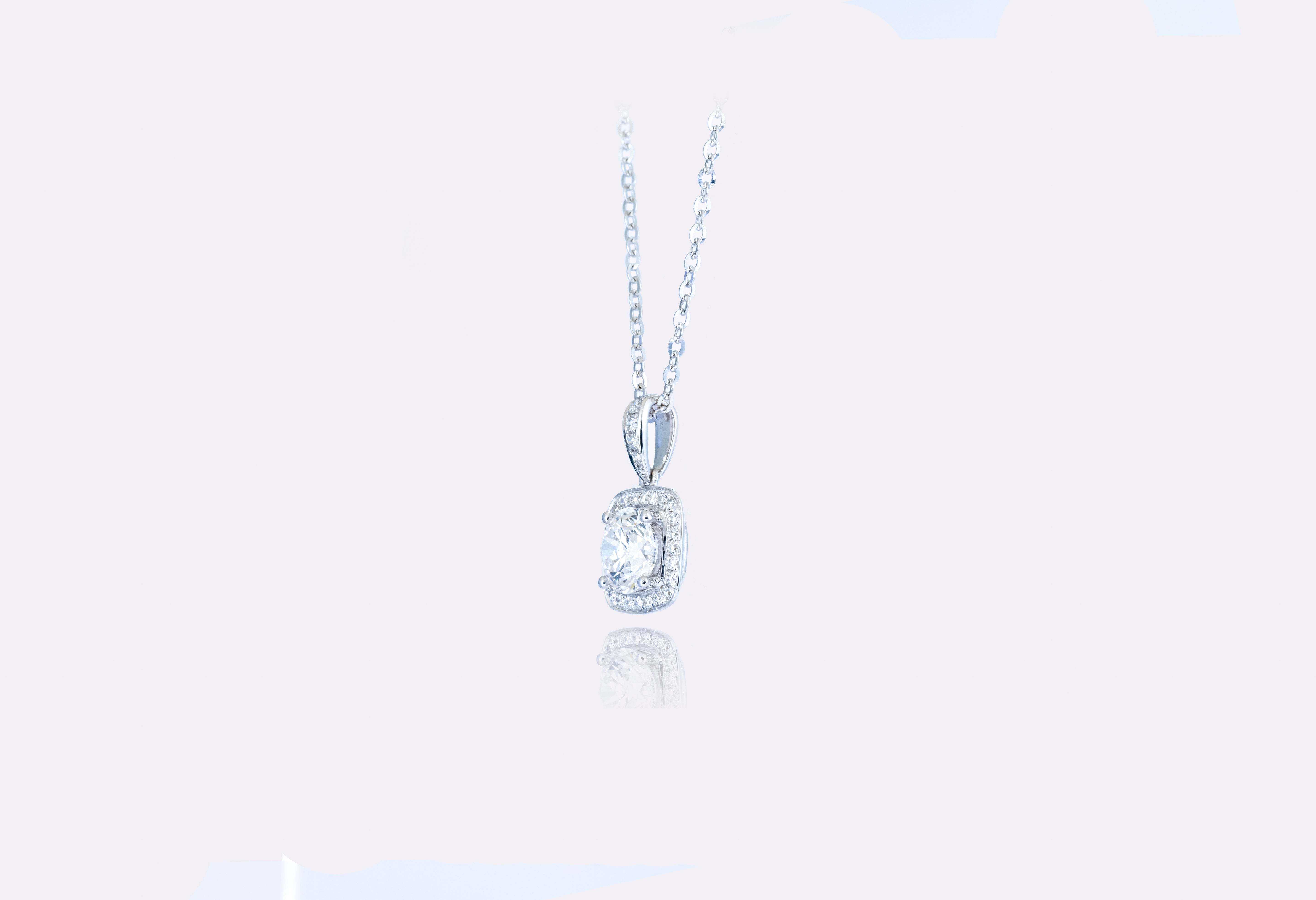 Luminous Harmony: Elegant Diamond Halo Pendant 