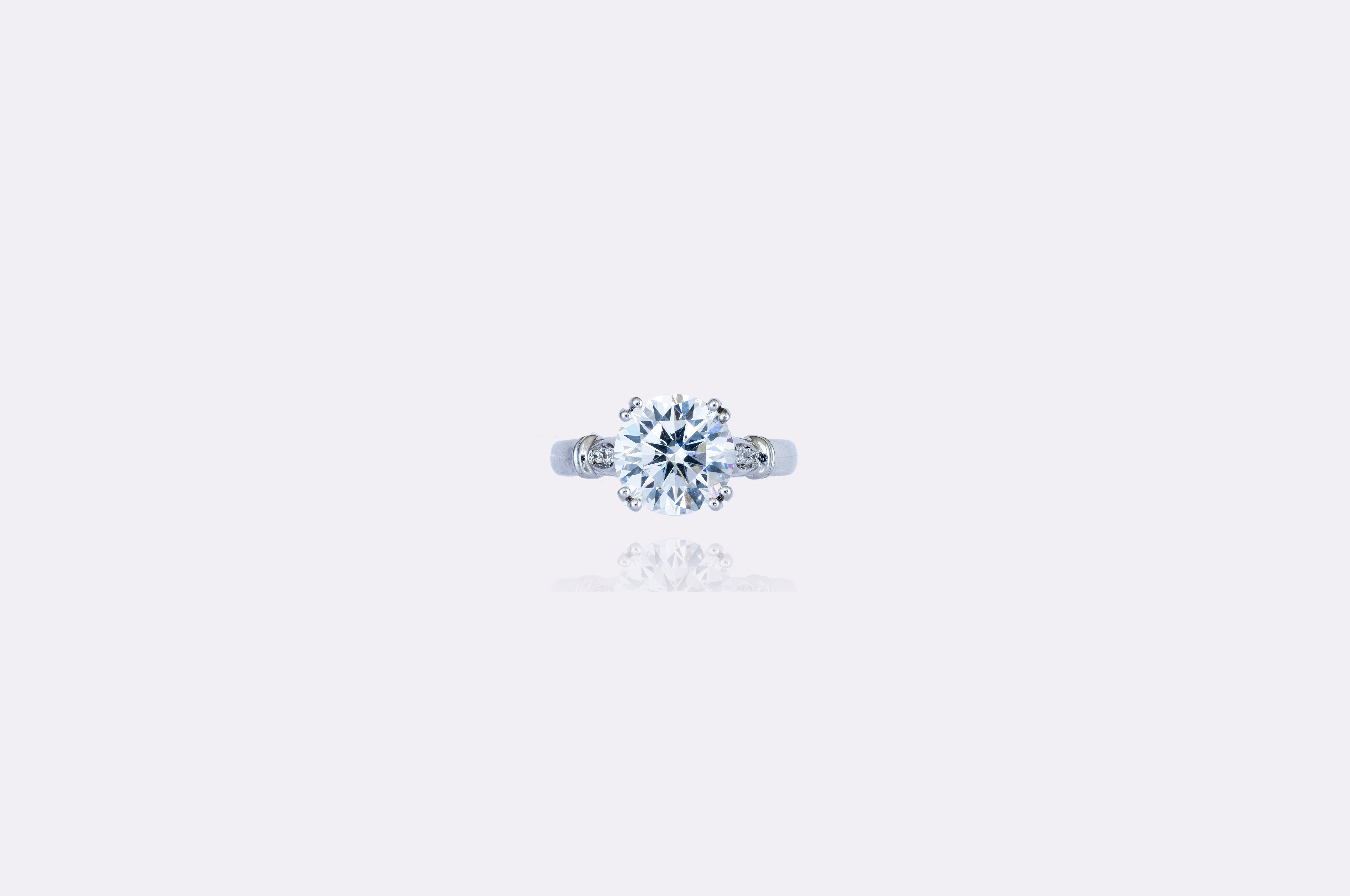 Luminous Solitaire: Classic Round-Cut Diamond Engagement Ring